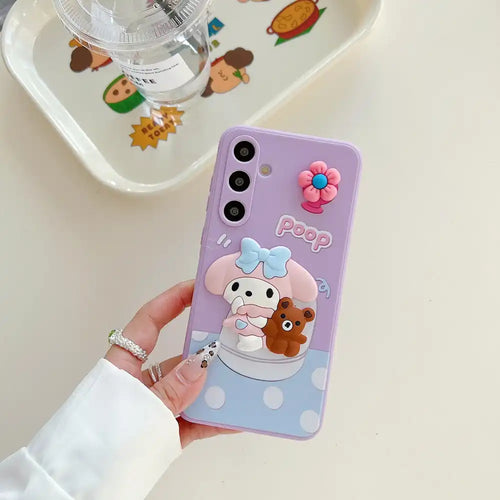 Purple phone case with cute cartoon characters and decorative flower embellishments.