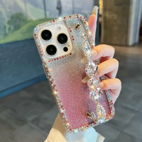 Sparkly pink and silver rhinestone-encrusted iPhone case with triple camera cutouts.